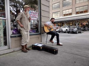 Busker-guitar guy